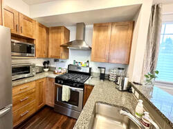 Gourmet kitchen with gas stove &amp; granite countertops